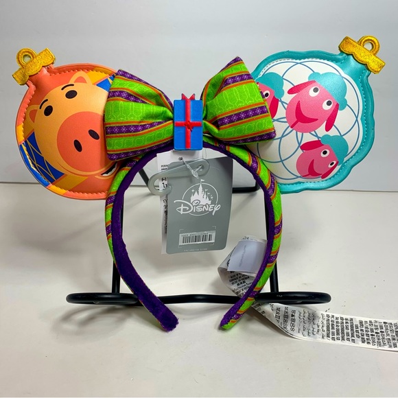 NWT. Disney Parks Pixar Christmas Ornament Toy Story Minnie Mouse Ears - Picture 1 of 9